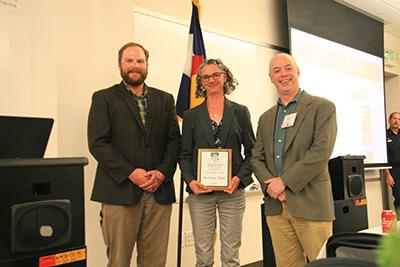 Dr. Linda Nagel receiving the 2019 CO/WY SAF Citizenship Award, with the CO/WY SAF Awards Chair (Sam Pankratz) and the CO/WY Chapter Chair (Chris Farley); Photo Credit: Phil Hoefer